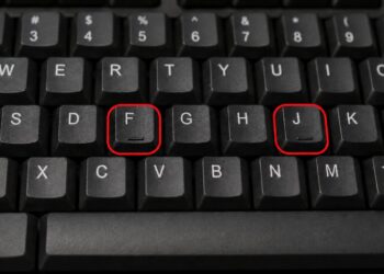 Por que as teclas F e J do teclado têm uma saliência ?