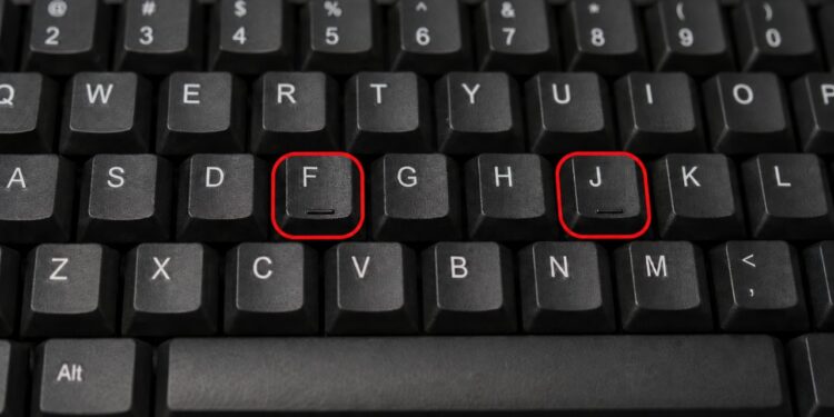 Por que as teclas F e J do teclado têm uma saliência ?