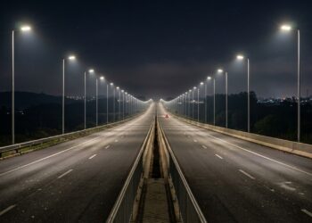 Por que os postes de luz na estrada nunca são espaçados igualmente, mesmo parecendo que são?