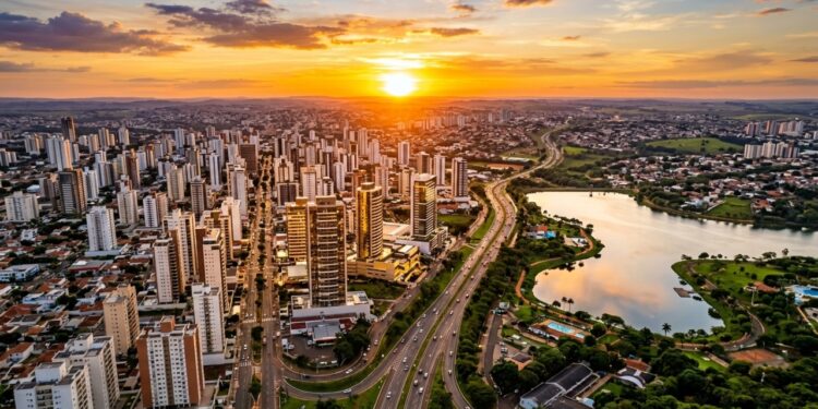 Vista aérea de São José do Rio Preto ao entardecer, com prédios, avenidas largas e áreas verdes. - (Imagem gerada por inteligência artificial-ChatGPT/Olhar Digital)