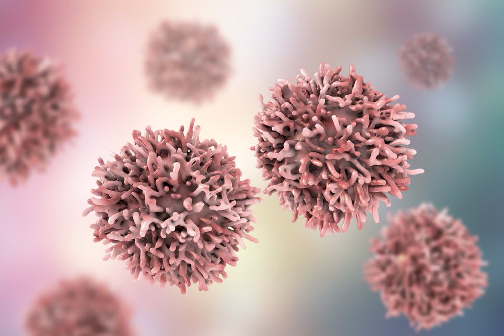 Duas células cancerosas em tons de rosa
