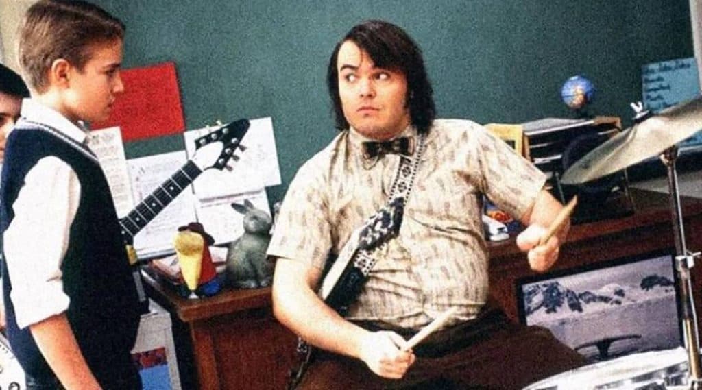 Kevin Clark, de 'Escola do Rock' (2003), ao lado do protagonista Jack Black no filme. Imagem: Paramount Pictures