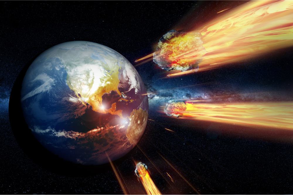 Ilustração mostra pedaços de meteoros em direção à Terra, ilustrando um novo sistema de defesa contra asteroides caso a Terra esteja sob risco de impacto