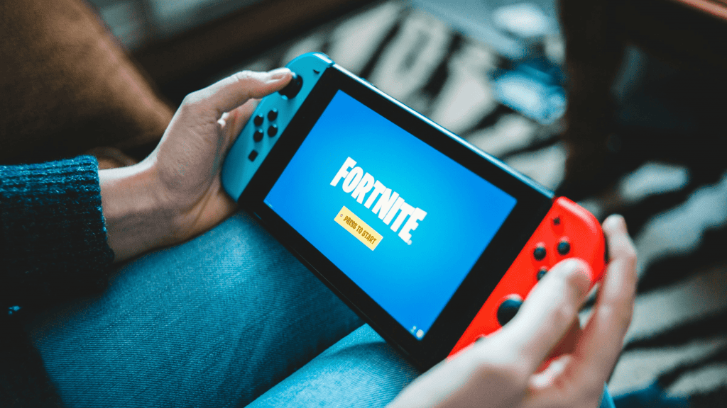Ilustração do console Nintendo Swtch reproduzindo o jogo Fortnite