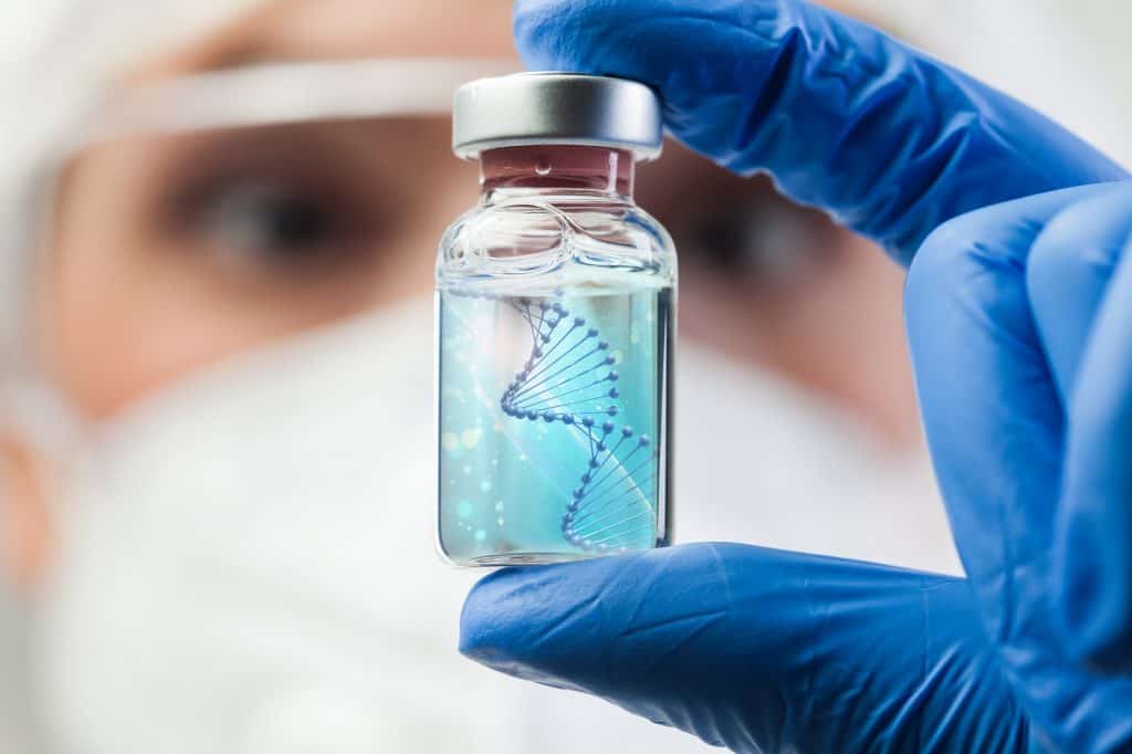 hélice de DNA dentro de um frasco com uma pessoa ao fundo olhando