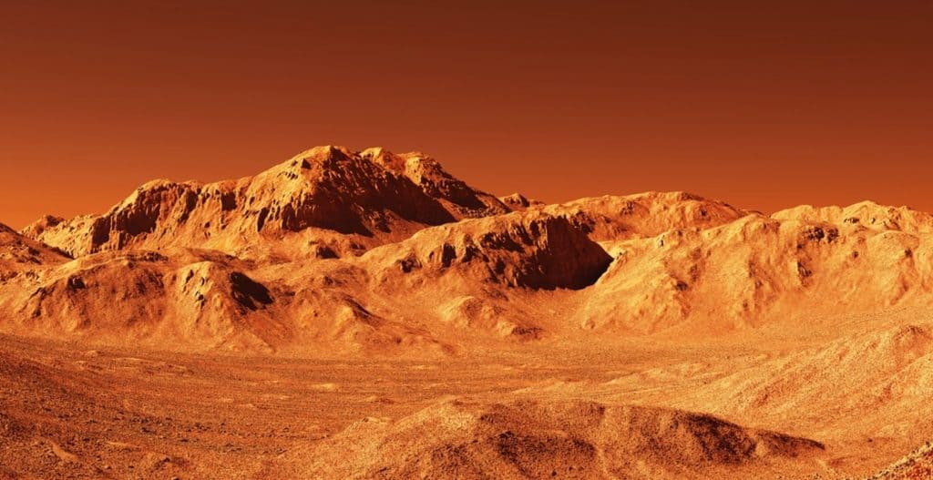 Ilustração do planeta Marte; superfície de Marte erodida em terra vermelha alaranjada