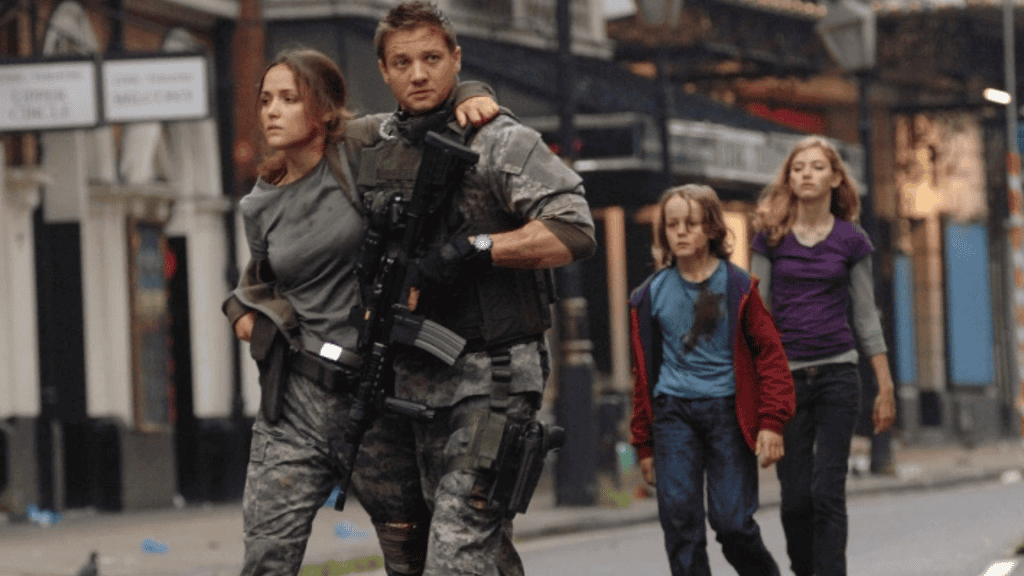 Jeremy Renner, Imogen Poots e Mackintosh Muggleton em cena de Extermínio 2 via 20th Century Fox/reprodução