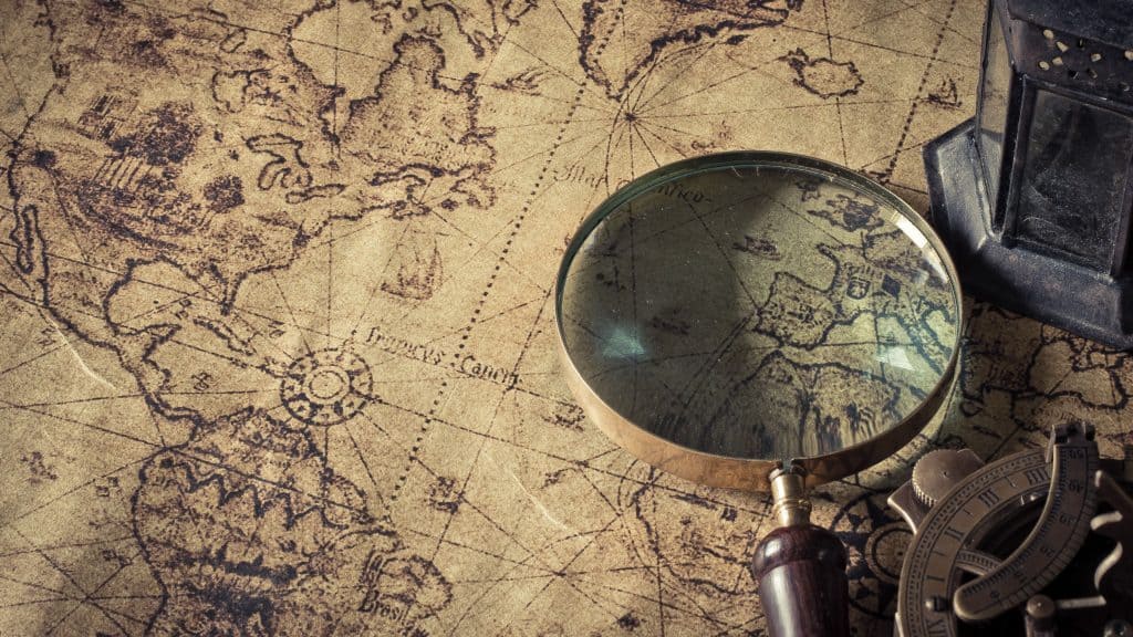 Lupa em cima da África em mapa estilo old school