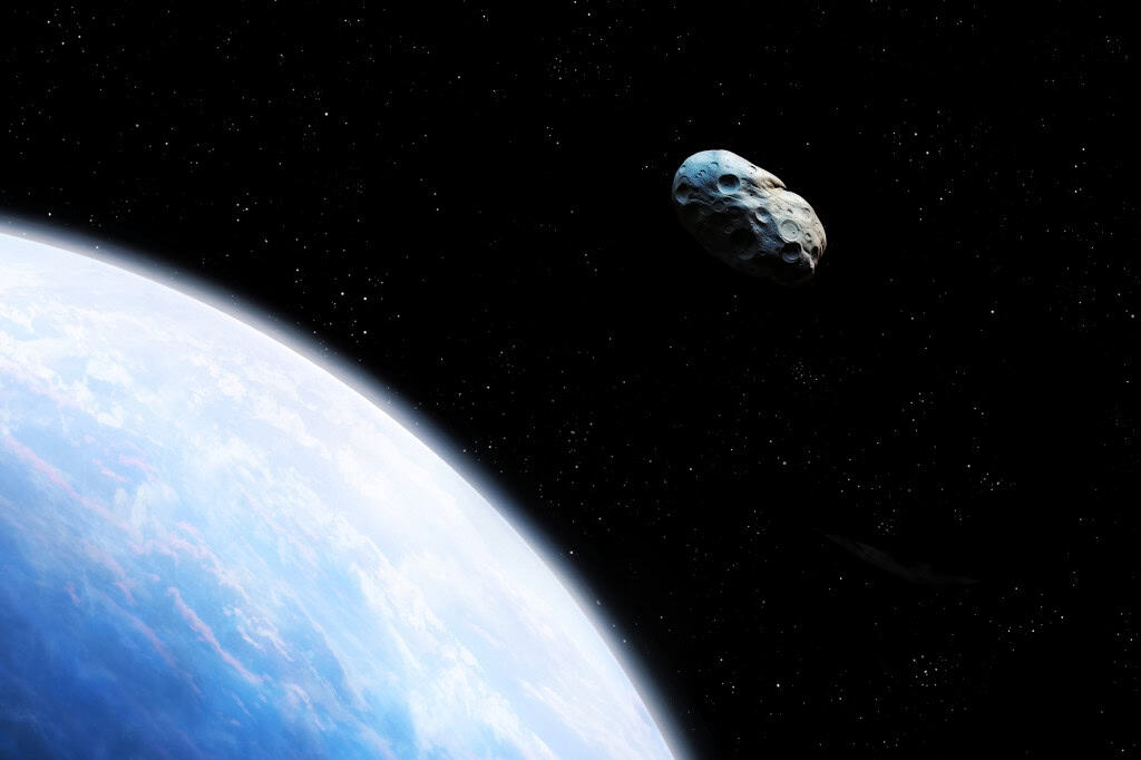 Representação artística de um asteroide passando perto da Terra