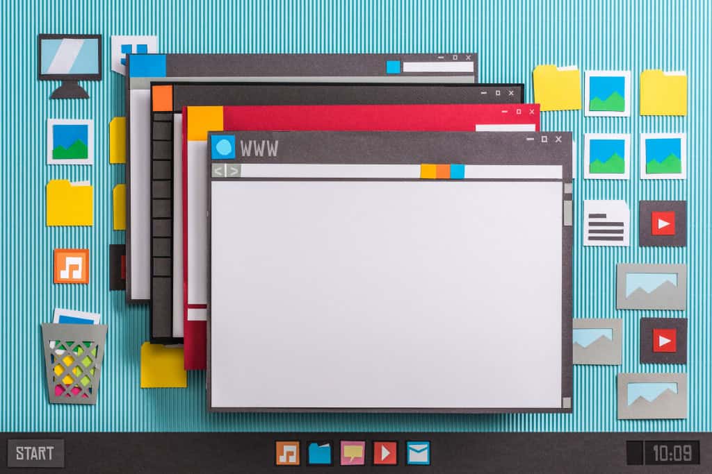 6 erros que deixam o processador do Windows mais lento e como resolvê-los É uma situação frustrante quando você está trabalhando, jogando ou simplesmente navegando na internet e, de repente, o PC Windows começa a travar. Os programas ficam lentos, o cursor do mouse move-se aos trancos e a ventoinha do computador começa a zumbir como se estivesse decolando. Interface de computador do sistema operacional e várias janelas de aplicativos abertas na área de trabalho