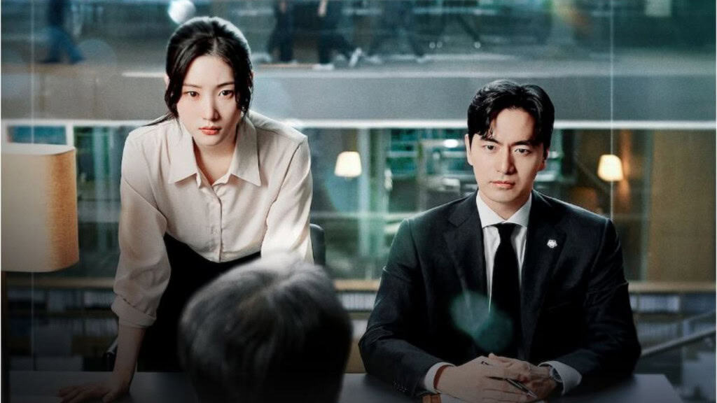 um casal coreano em uma mesa de reunião olhando com atenção para um homem sentado a sua frente. 