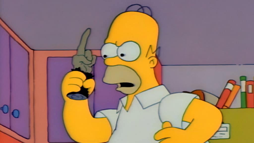 Homer holding a monkey's paw