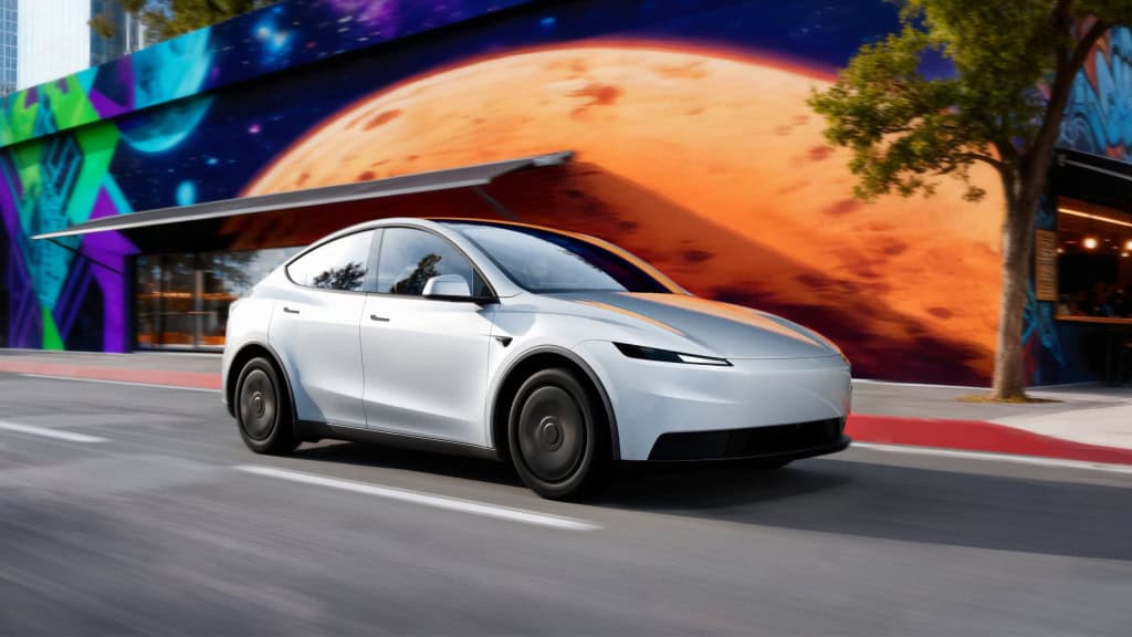 Mudança na Tesla gera dúvidas sobre direção autônoma e segurança dos veículos A Tesla mudou a forma como comunica sobre a direção autônoma de seus veículos. Agora, a empresa não garante mais que todos os carros têm hardware completo para autonomia, afirmando que seus veículos são “projetados para autonomia”, segundo o site Electrek. Novo modelo da Tesla andando em rua, passando por muro grafitado