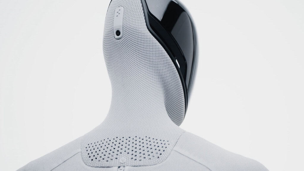 Figure 03: o robô humanoide que quer levar a IA da nuvem para o chão da sua casa O Figure 03, robô humanoide lançado pela startup americana Figure AI nesta semana, foi eleito uma das melhores invenções de 2025 pela revista Time. O modelo promete levar a inteligência artificial (IA) para o mundo físico, com mãos sensíveis, câmeras nas palmas e um sistema capaz de aprender tarefas humanas com poucos dados. Close na nuca e nos ombros do robô Figure 03