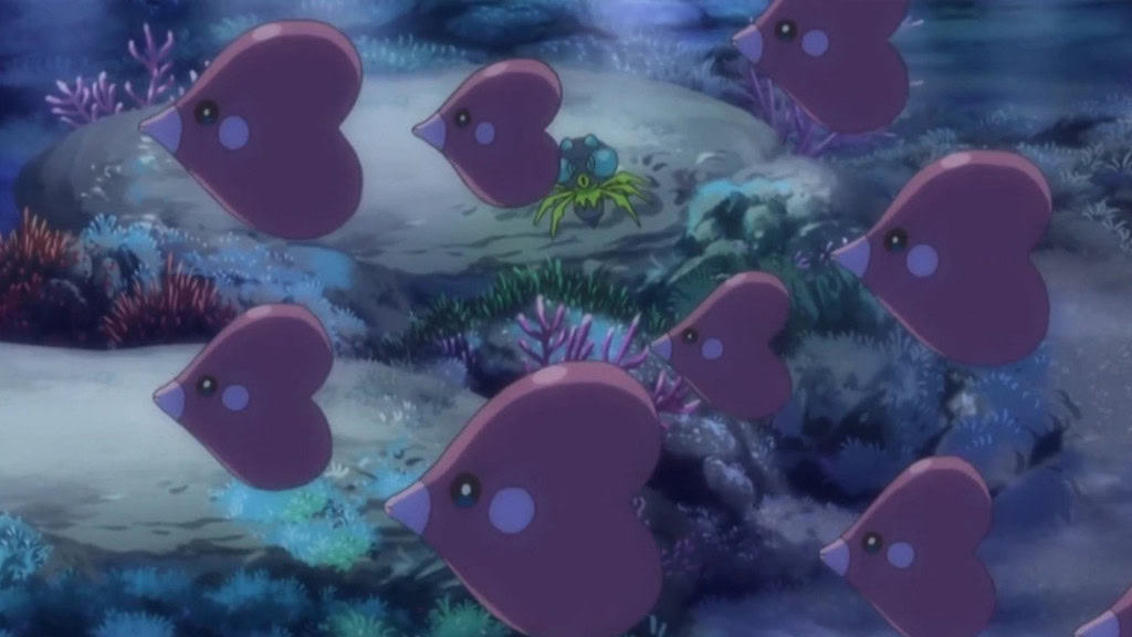 Cardume de Pokémons Luvdisc nadando no mar